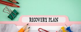 business folder labeled as recovery plan